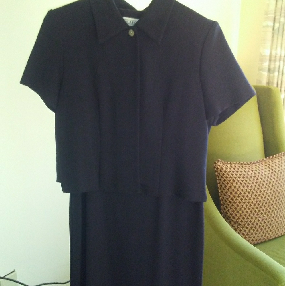 This a Jesse howard dress with a jacket